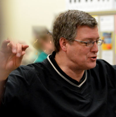 George Waldie Jr. directs the West Chester Area Community Chorus in rehearsal
